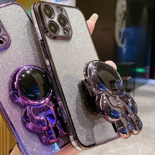 Luxus-Glitzer-Astronauten-Falt-Silikonhülle mit Ständer und Handhalterung für Apple iPhone 16/15/14/13/12 Pro Max Plus Mini | Stoßfest, wasserabweisend & fingerabdruckfrei